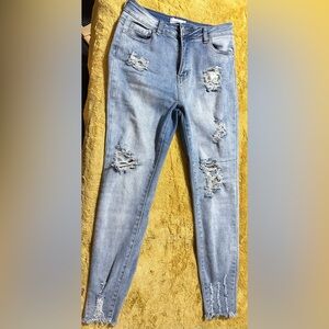 Women's Distressed Blue Jeans